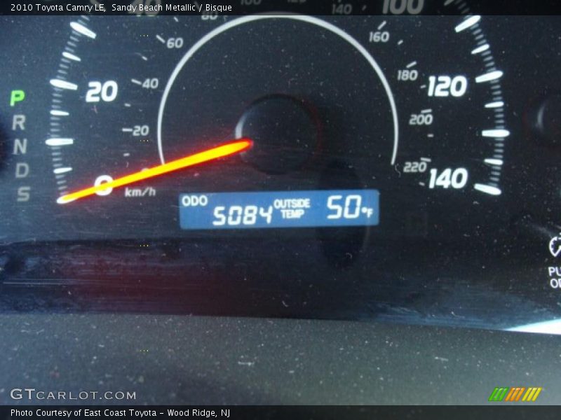 Sandy Beach Metallic / Bisque 2010 Toyota Camry LE