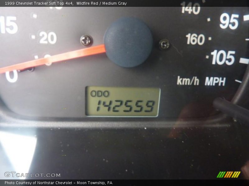 Wildfire Red / Medium Gray 1999 Chevrolet Tracker Soft Top 4x4