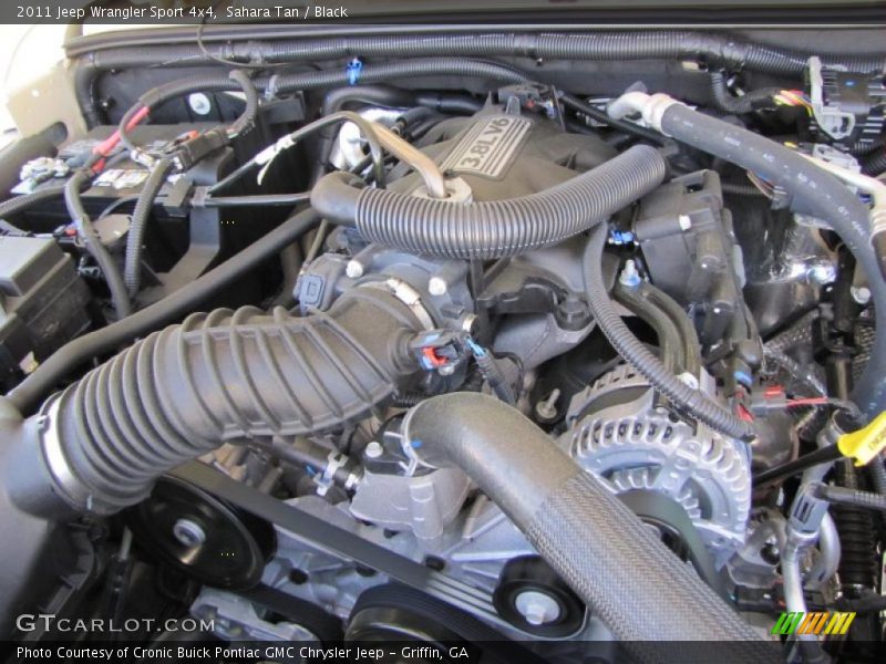 Sahara Tan / Black 2011 Jeep Wrangler Sport 4x4