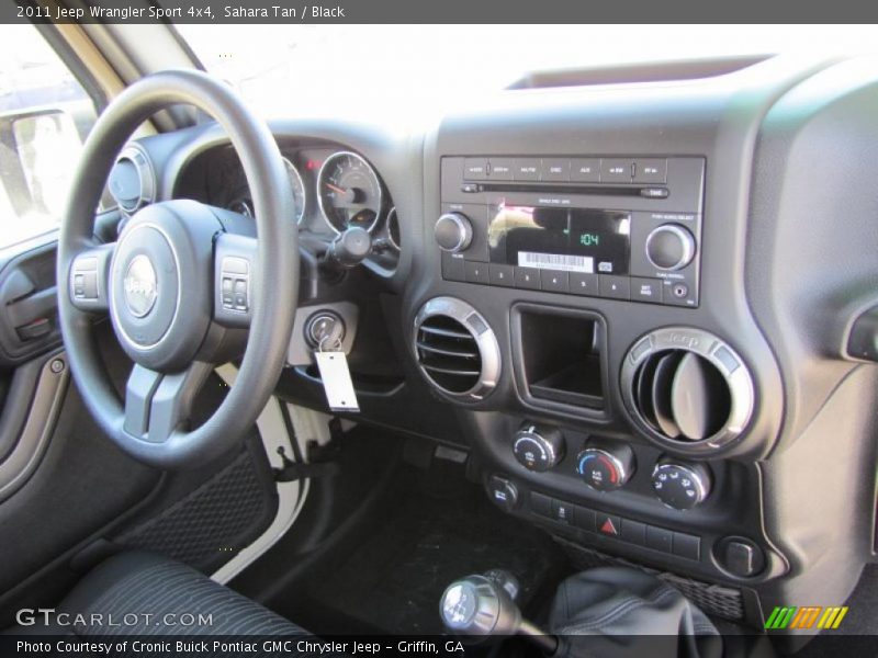 Sahara Tan / Black 2011 Jeep Wrangler Sport 4x4