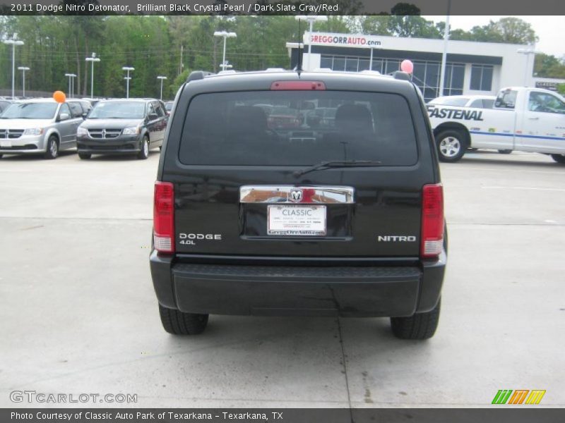 Brilliant Black Crystal Pearl / Dark Slate Gray/Red 2011 Dodge Nitro Detonator