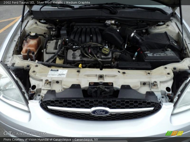 Silver Frost Metallic / Medium Graphite 2002 Ford Taurus SES