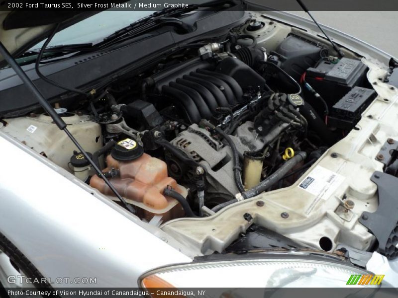 Silver Frost Metallic / Medium Graphite 2002 Ford Taurus SES