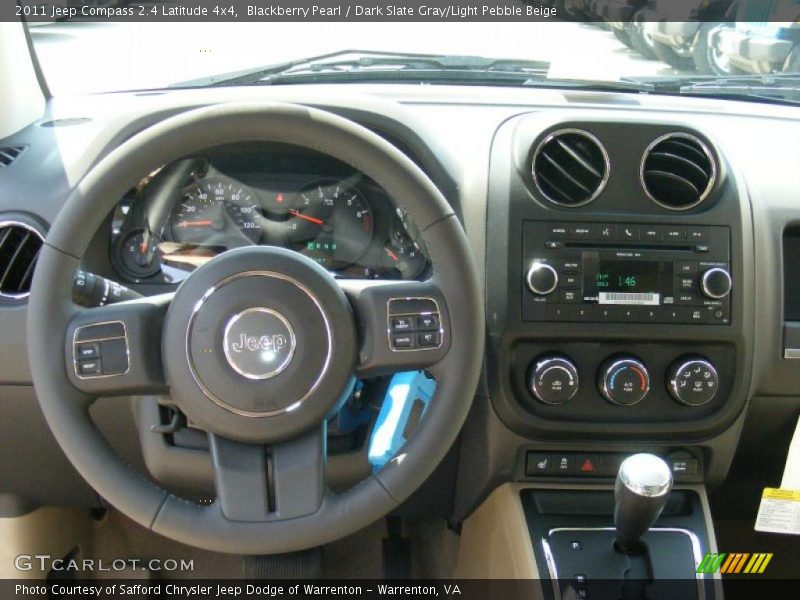 Dashboard of 2011 Compass 2.4 Latitude 4x4