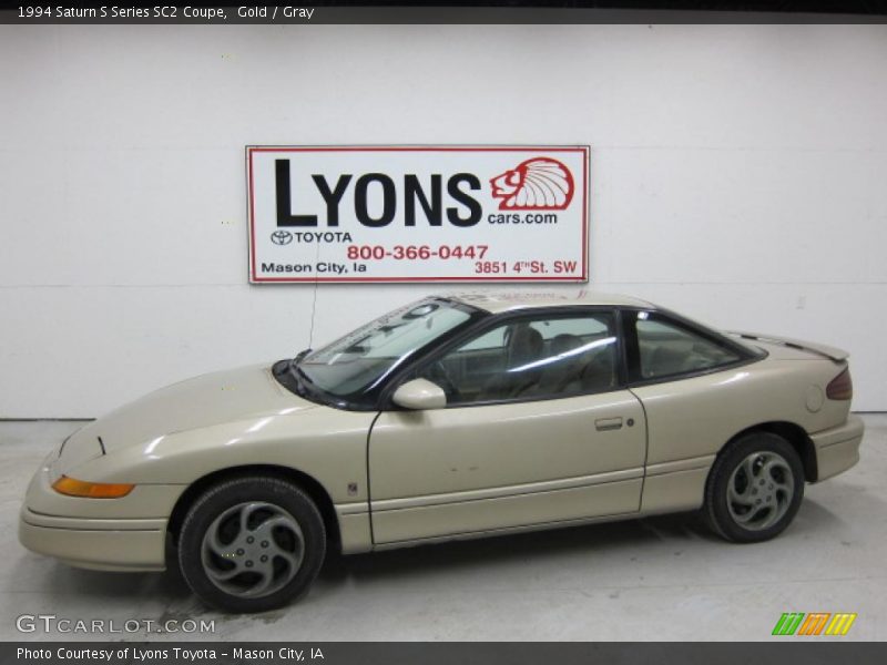 Gold / Gray 1994 Saturn S Series SC2 Coupe