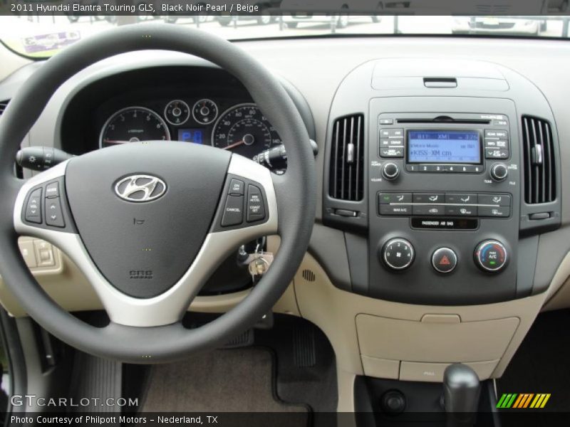 Dashboard of 2011 Elantra Touring GLS