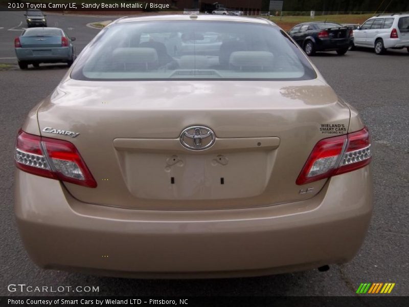 Sandy Beach Metallic / Bisque 2010 Toyota Camry LE