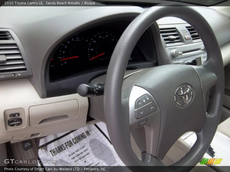 Sandy Beach Metallic / Bisque 2010 Toyota Camry LE
