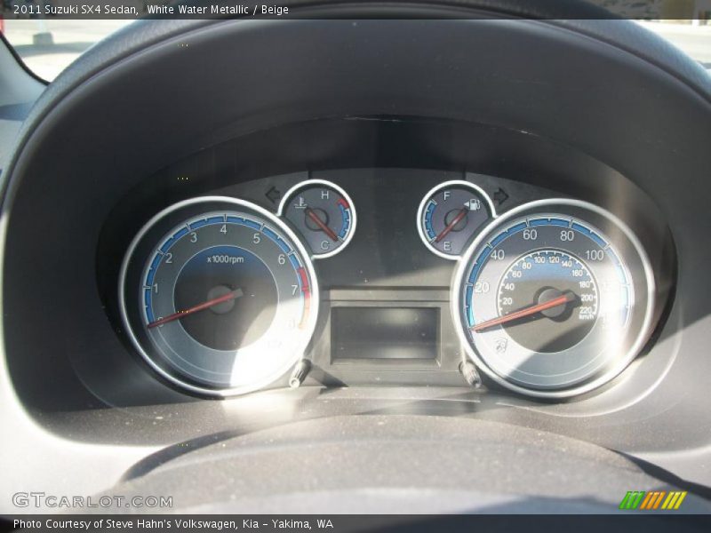 White Water Metallic / Beige 2011 Suzuki SX4 Sedan