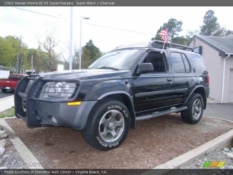 Front 3/4 View of 2003 Xterra SE V6 Supercharged