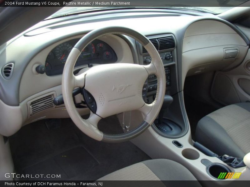 Redfire Metallic / Medium Parchment 2004 Ford Mustang V6 Coupe