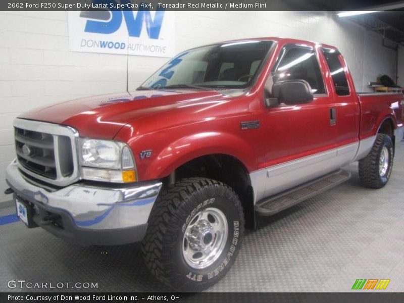 Toreador Red Metallic / Medium Flint 2002 Ford F250 Super Duty Lariat SuperCab 4x4