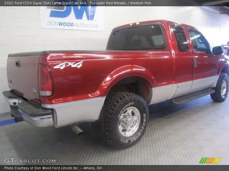 Toreador Red Metallic / Medium Flint 2002 Ford F250 Super Duty Lariat SuperCab 4x4
