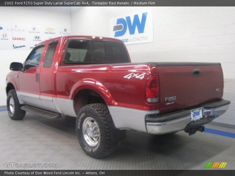 Toreador Red Metallic / Medium Flint 2002 Ford F250 Super Duty Lariat SuperCab 4x4