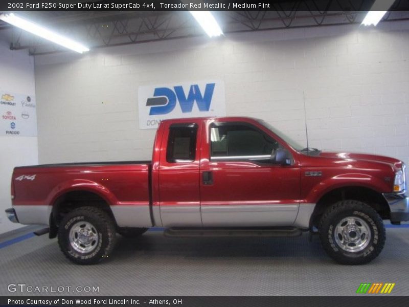 Toreador Red Metallic / Medium Flint 2002 Ford F250 Super Duty Lariat SuperCab 4x4