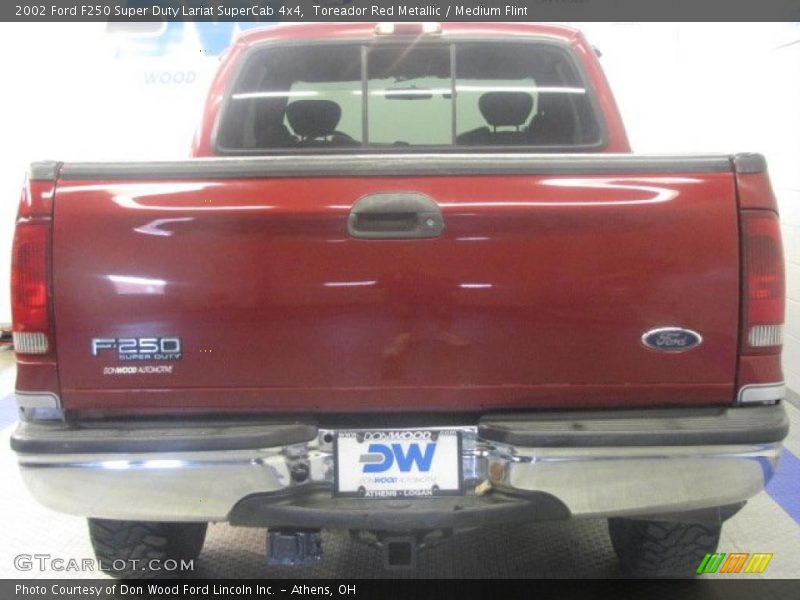 Toreador Red Metallic / Medium Flint 2002 Ford F250 Super Duty Lariat SuperCab 4x4