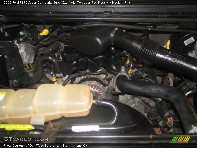 Toreador Red Metallic / Medium Flint 2002 Ford F250 Super Duty Lariat SuperCab 4x4