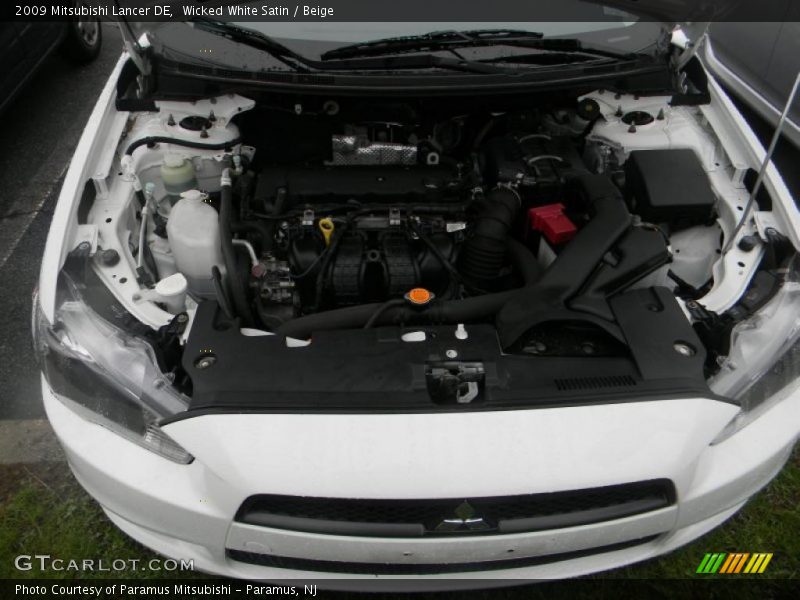 Wicked White Satin / Beige 2009 Mitsubishi Lancer DE