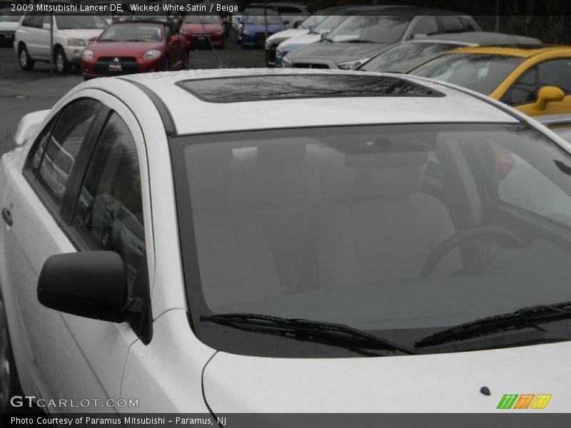 Wicked White Satin / Beige 2009 Mitsubishi Lancer DE