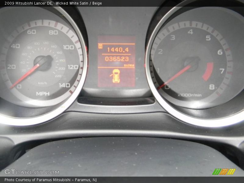 Wicked White Satin / Beige 2009 Mitsubishi Lancer DE