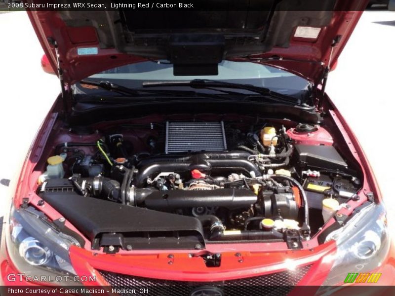 Lightning Red / Carbon Black 2008 Subaru Impreza WRX Sedan