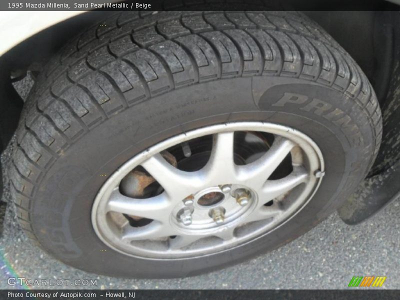 Sand Pearl Metallic / Beige 1995 Mazda Millenia