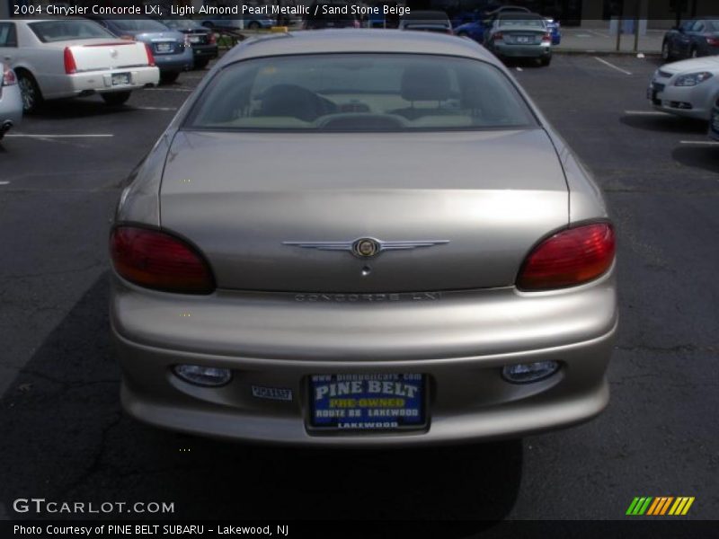 Light Almond Pearl Metallic / Sand Stone Beige 2004 Chrysler Concorde LXi