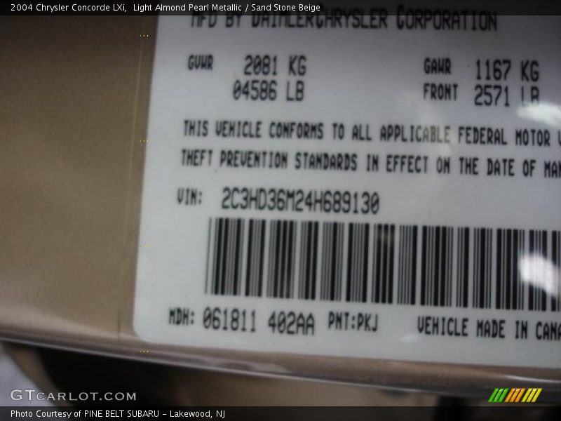 Light Almond Pearl Metallic / Sand Stone Beige 2004 Chrysler Concorde LXi