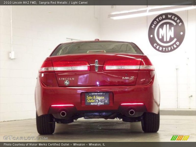 Sangria Red Metallic / Light Camel 2010 Lincoln MKZ FWD