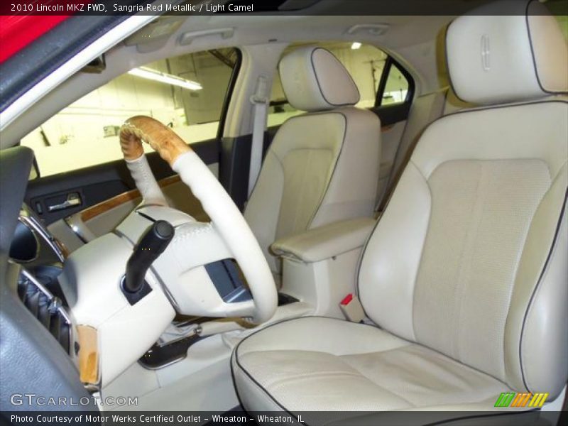 Sangria Red Metallic / Light Camel 2010 Lincoln MKZ FWD