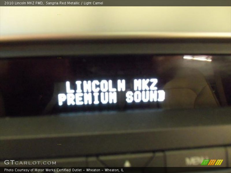 Sangria Red Metallic / Light Camel 2010 Lincoln MKZ FWD