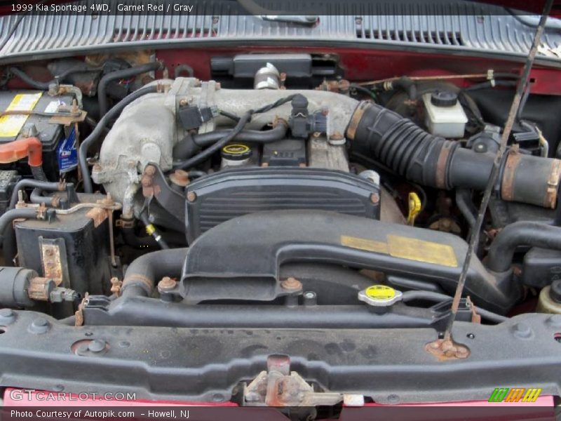 Garnet Red / Gray 1999 Kia Sportage 4WD