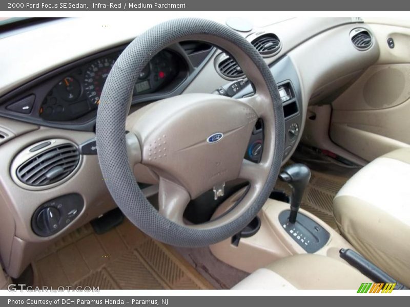 Infra-Red / Medium Parchment 2000 Ford Focus SE Sedan