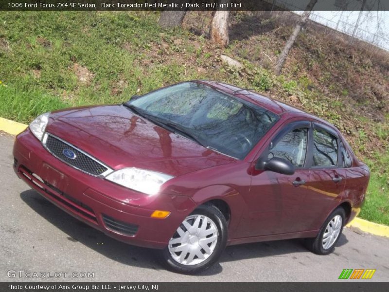 Dark Toreador Red Metallic / Dark Flint/Light Flint 2006 Ford Focus ZX4 SE Sedan