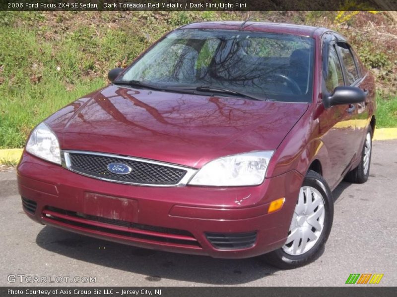Dark Toreador Red Metallic / Dark Flint/Light Flint 2006 Ford Focus ZX4 SE Sedan