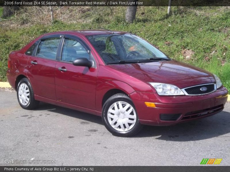 Dark Toreador Red Metallic / Dark Flint/Light Flint 2006 Ford Focus ZX4 SE Sedan