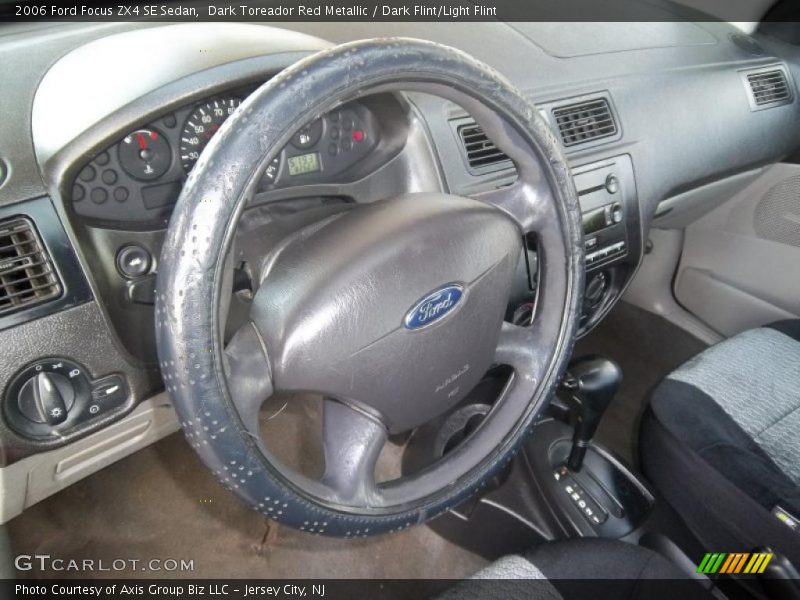 Dark Toreador Red Metallic / Dark Flint/Light Flint 2006 Ford Focus ZX4 SE Sedan