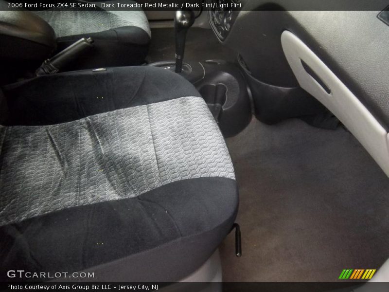Dark Toreador Red Metallic / Dark Flint/Light Flint 2006 Ford Focus ZX4 SE Sedan