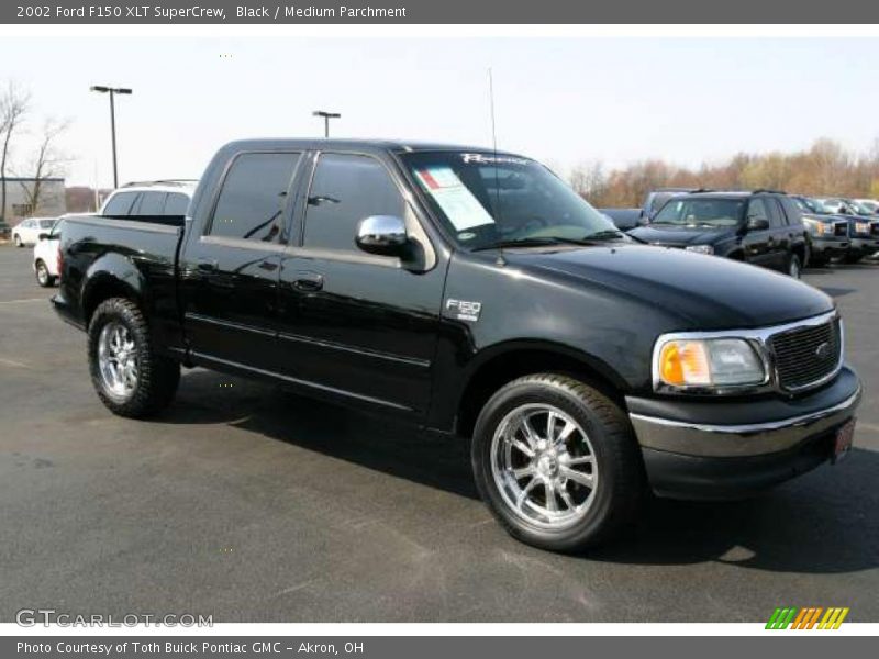 Black / Medium Parchment 2002 Ford F150 XLT SuperCrew