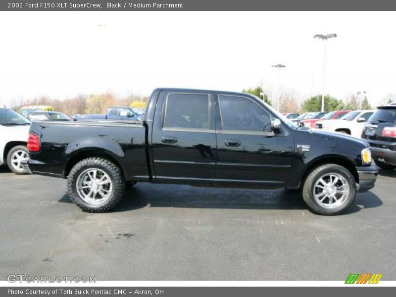 Black / Medium Parchment 2002 Ford F150 XLT SuperCrew