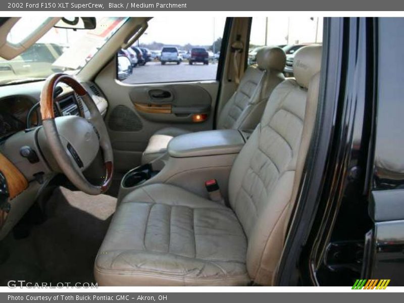 Black / Medium Parchment 2002 Ford F150 XLT SuperCrew