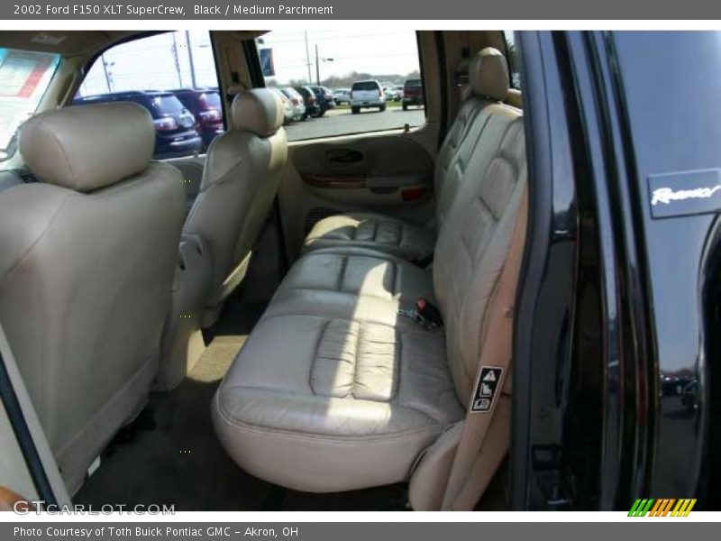 Black / Medium Parchment 2002 Ford F150 XLT SuperCrew