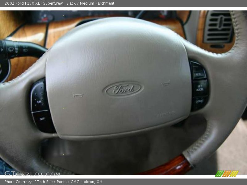 Black / Medium Parchment 2002 Ford F150 XLT SuperCrew