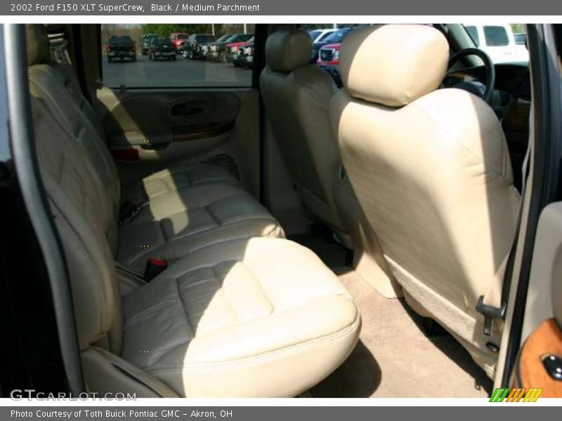 Black / Medium Parchment 2002 Ford F150 XLT SuperCrew