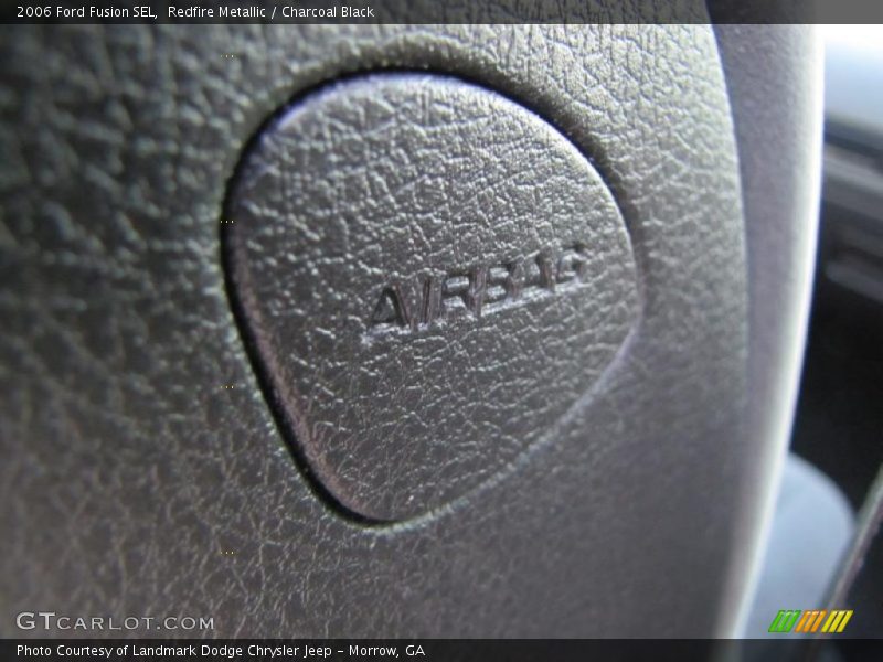 Redfire Metallic / Charcoal Black 2006 Ford Fusion SEL