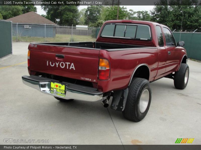 Sunfire Red Pearl / Gray 1995 Toyota Tacoma Extended Cab 4x4