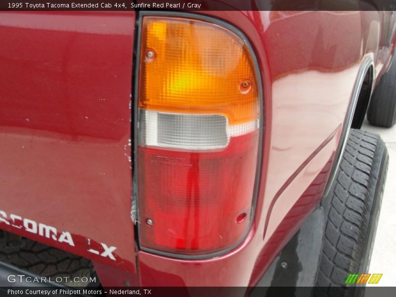 Sunfire Red Pearl / Gray 1995 Toyota Tacoma Extended Cab 4x4