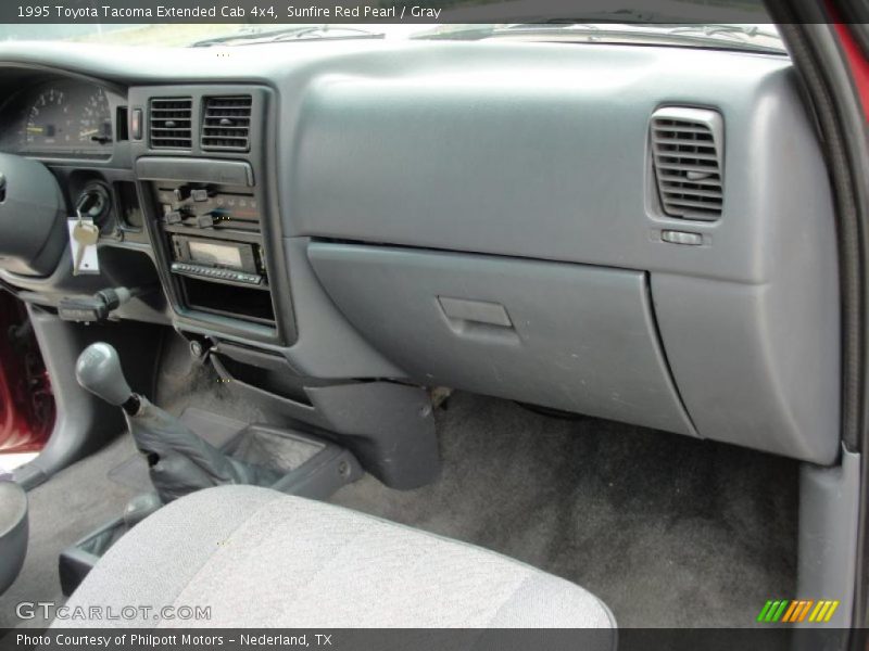 Sunfire Red Pearl / Gray 1995 Toyota Tacoma Extended Cab 4x4