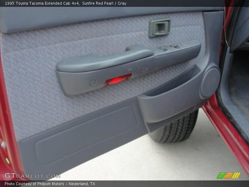 Sunfire Red Pearl / Gray 1995 Toyota Tacoma Extended Cab 4x4