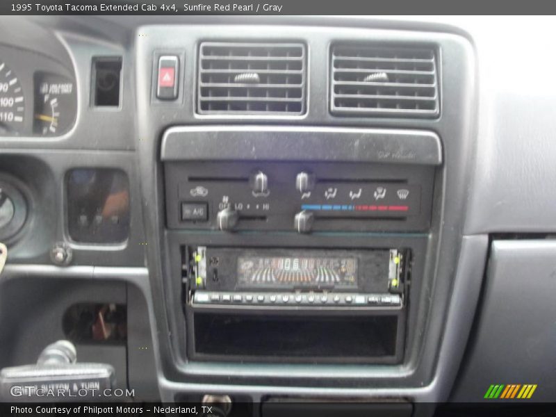 Sunfire Red Pearl / Gray 1995 Toyota Tacoma Extended Cab 4x4